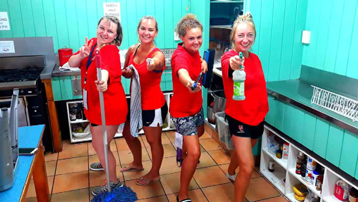 four cleaners posing