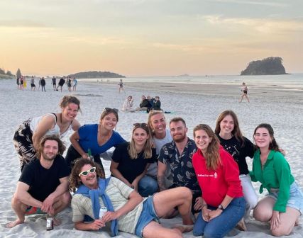 backpackers on beach.jpeg